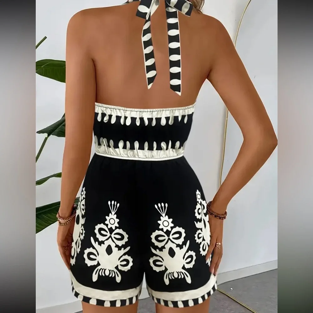 Boho Chic Black Floral halter romper Sz
Large women’s summer evening casual
NWOT - Picture 2 of 3